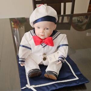 Porcelain Sailor Doll with Red Bow